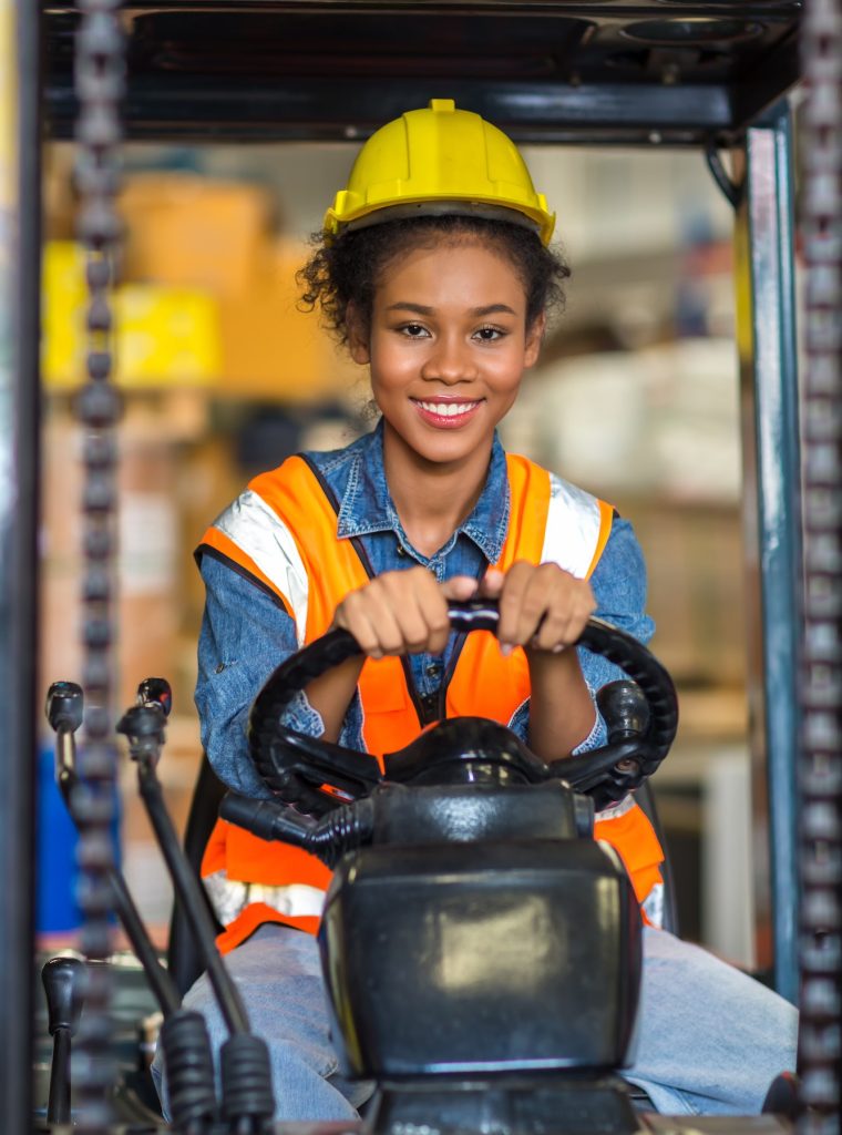 women-worker-at-forklift-driver-happy-working-in-industry-factory-logistic-ship-.jpg